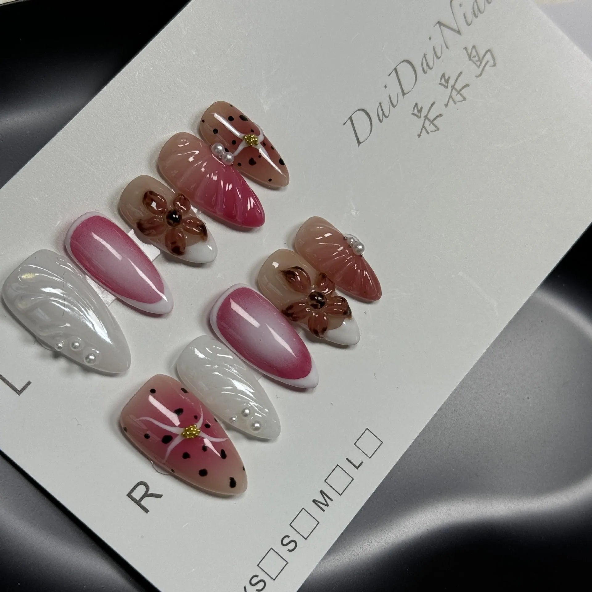 Hand-painted three-dimensional carved nail beauty patch in almond shape with embossed pattern
