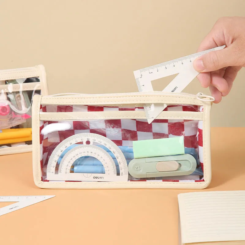 Transparent PVC pencil case with chessboard pattern showing pens inside, 21.5 cm length