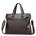 Men's black PU leather messenger bag with crossbody strap and splicing design