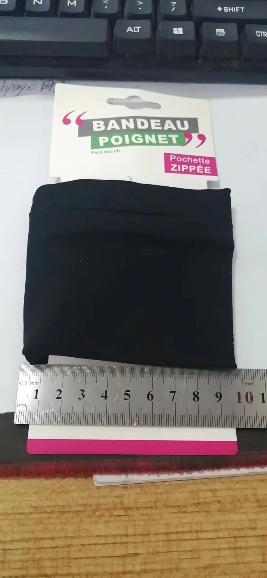 Wrist bag armband sleeve measuring 10 by 10.5 cm with OPP and cardboard packaging