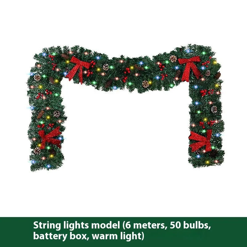 Christmas rattan decoration with PVC pine cone bow, available with optional LED lighting in warm white or coloured variants.