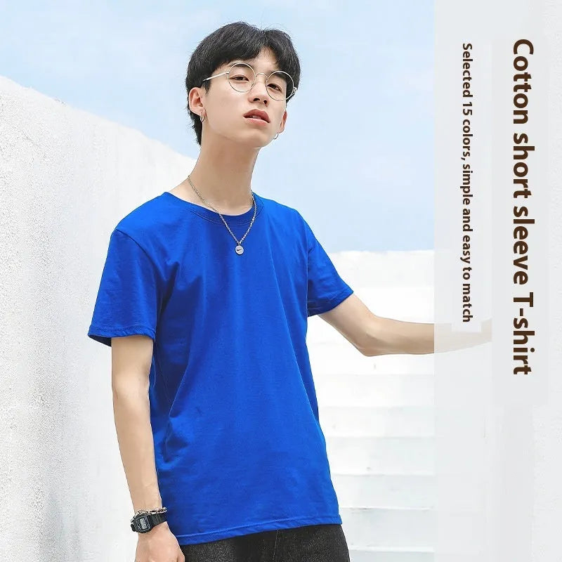 Men's solid colour cotton T-shirt on a hanger, showing the round neck and short sleeve design.