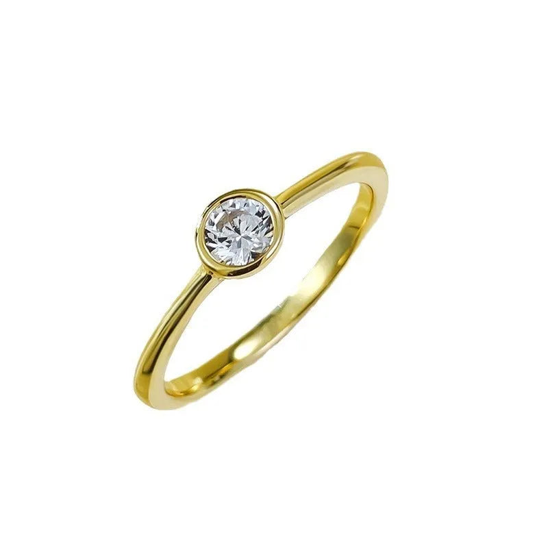 Minimalist silver crown-shaped ring with linear engraving detail in gold or platinum finish