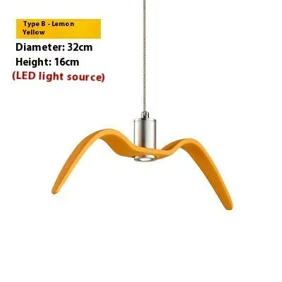 Nordic style ceiling chandelier with macaron colour options shown in a dining room setting.