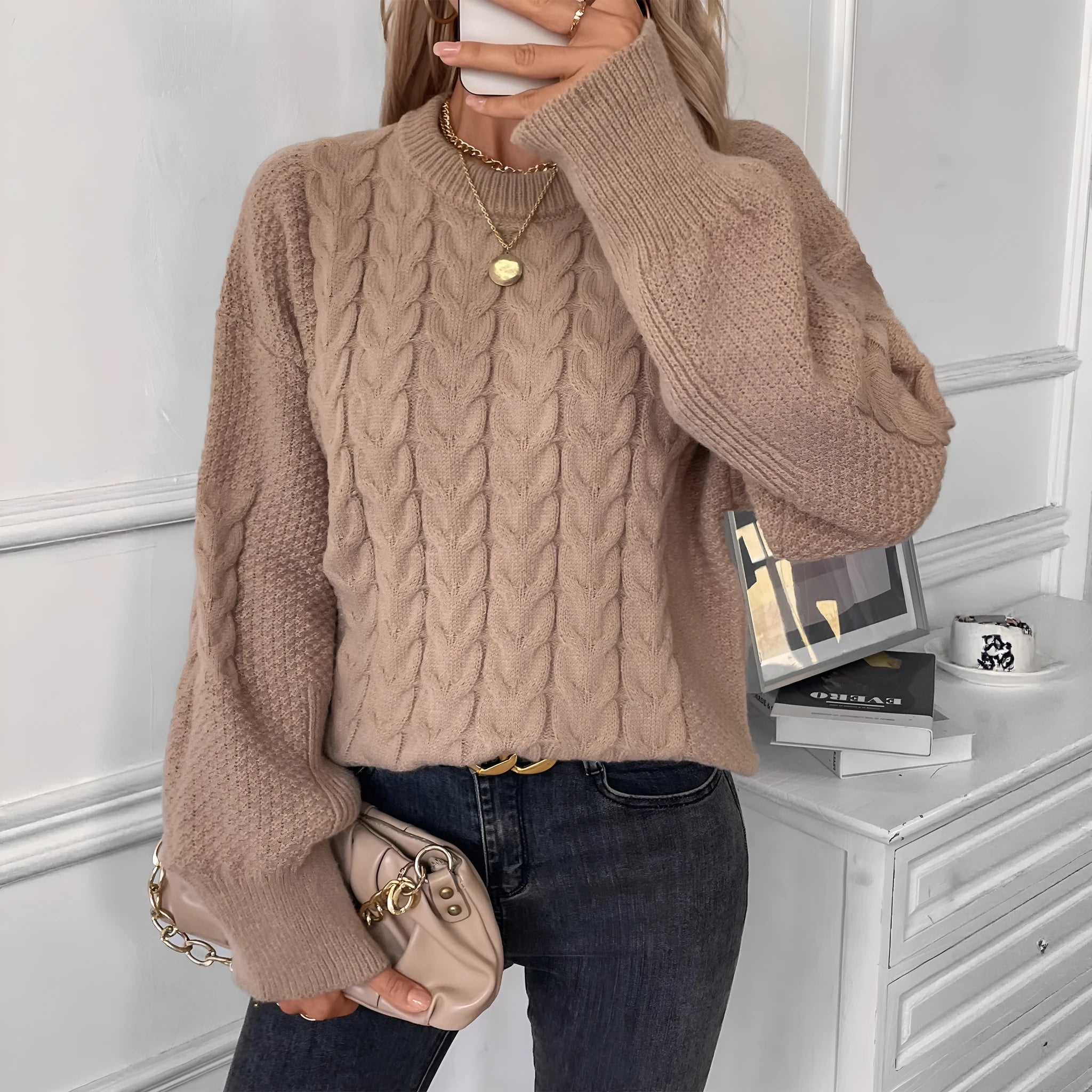 Women's beige loose sweater with twist stitch pattern and round neck
