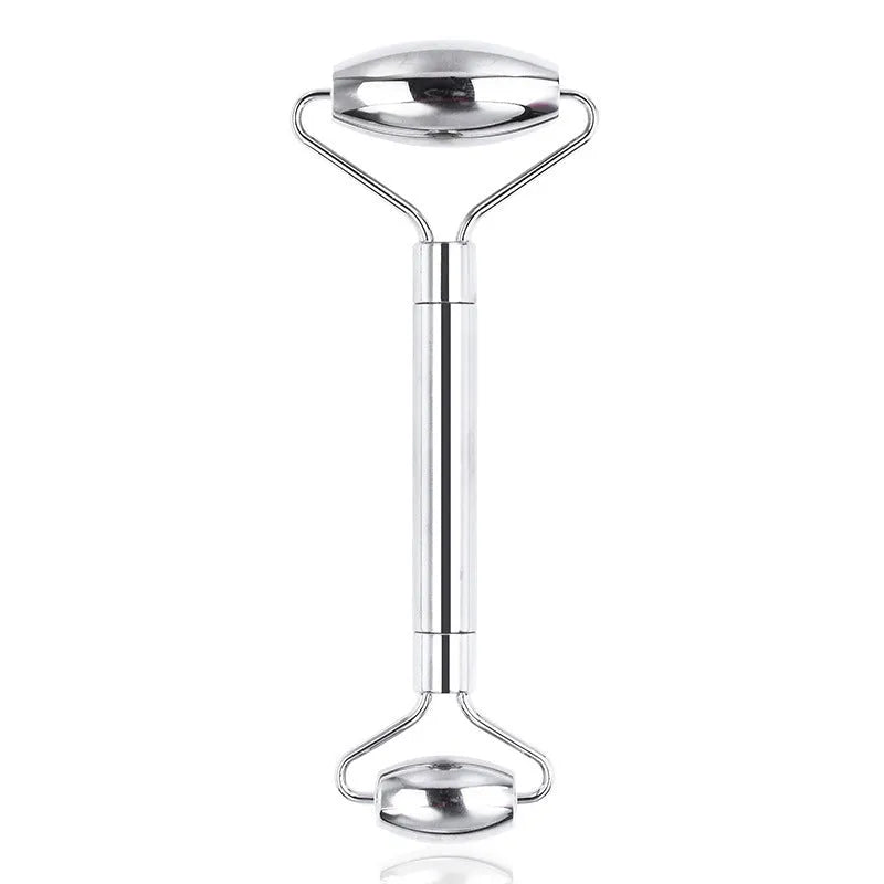 Stainless steel facial massage board with double head roller and heart-shaped eye poking stick for acupressure therapy