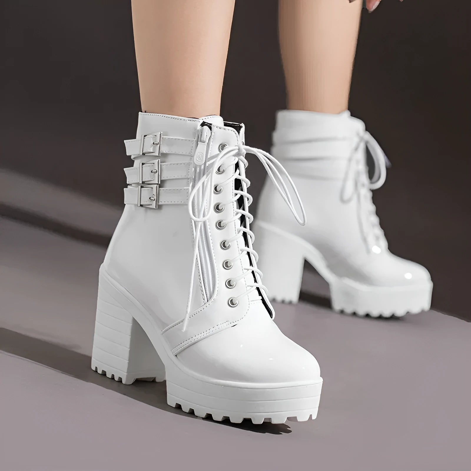 Women's black ankle boots with 6-8cm block heel, round toe, and lace-up front