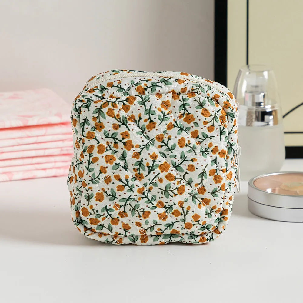 Floral polyester key storage bag with sewing thread detailing in multiple colour patterns