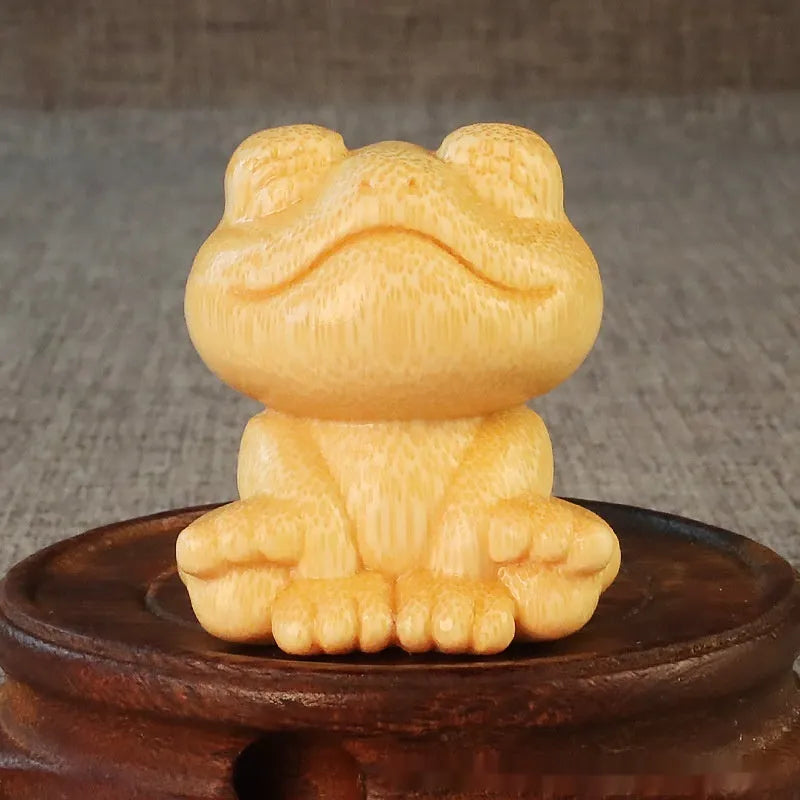 Smiling frog bamboo carving ornament measuring 5cm height with cartoon cute style decorative design