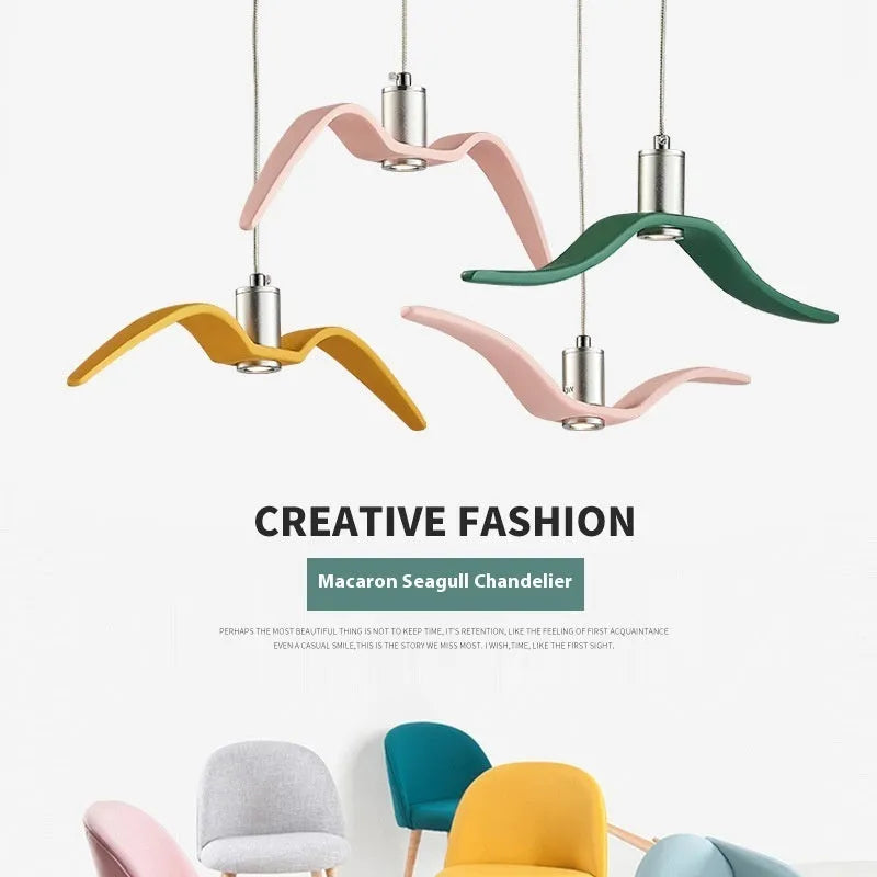 Nordic style ceiling chandelier with macaron colour options shown in a dining room setting.