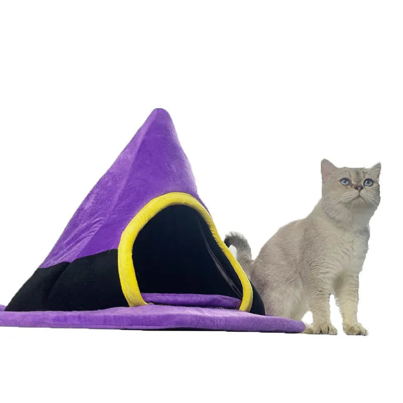 Purple Halloween witch hat shaped cat bed measuring 60cm by 45cm