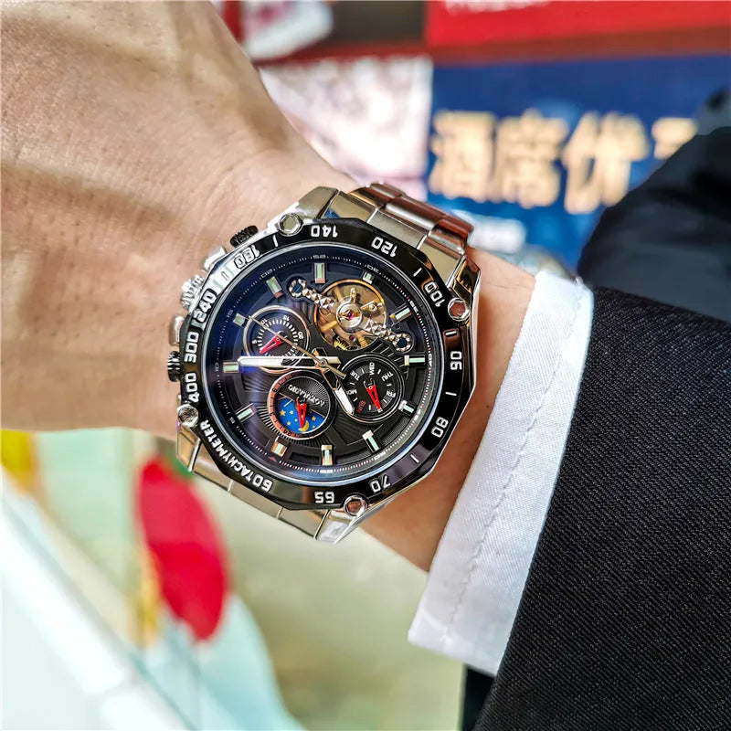 Men's automatic mechanical watch with silver case and black dial showing 12mm thickness