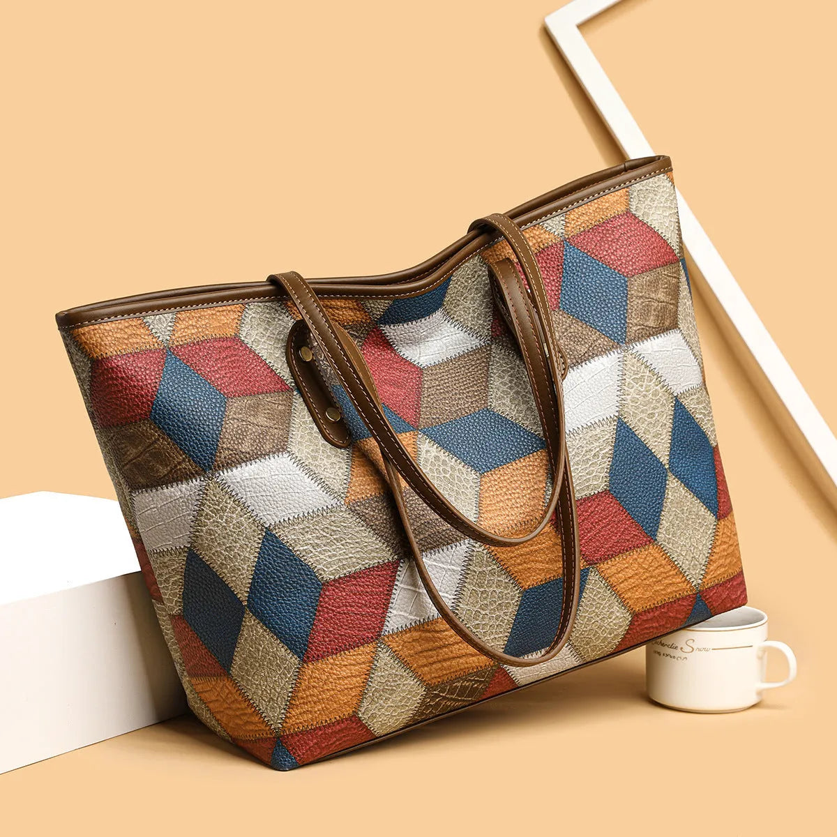 Women's large capacity PVC shoulder bag in blue brown colour with sandwich pocket design