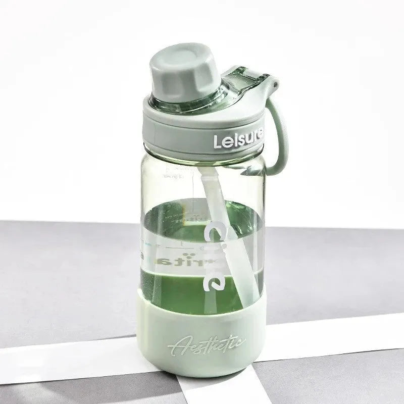 Heat-resistant plastic drinking cup in grey green or pink with cartoon pattern