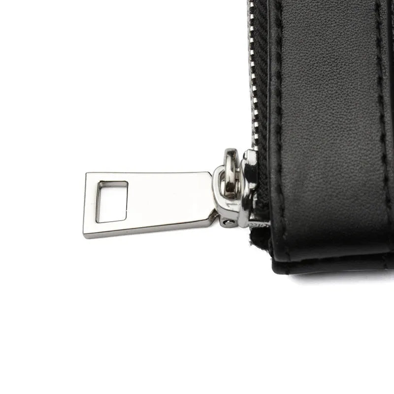 Black leather plaid clutch wallet showing cowhide texture and 20x10cm dimensions