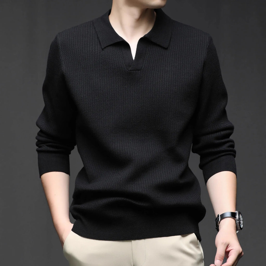 Men's loose fit plain pullover sweater in green, shown on a model for scale.