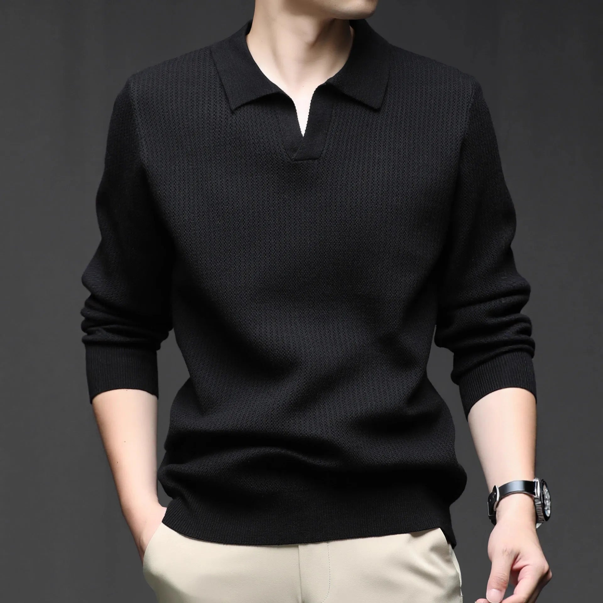 Men's loose fit plain pullover sweater in green, shown on a model for scale.