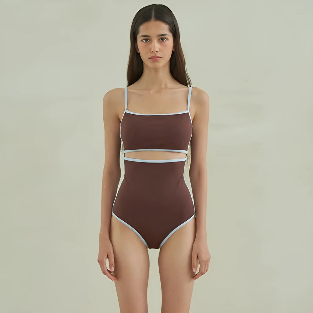 Brown triangle one-piece swimsuit for women on a hanger, showing front design.