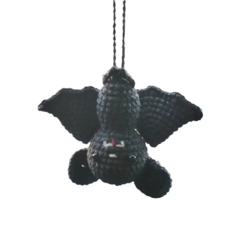 Plush hand-woven car hanging ornament in a cartoon design made from polyester