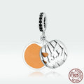 S925 sterling silver Halloween beaded bracelet with pumpkin and skull charms on a neutral background