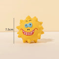 Four colourful squeaky dog toys with cute faces made from natural latex rubber
