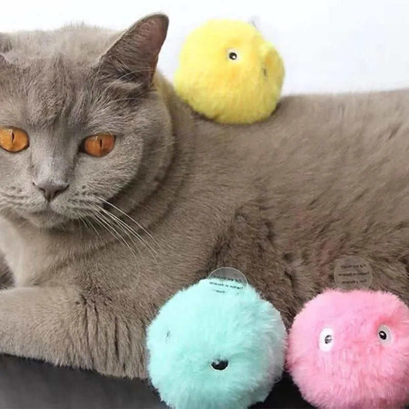 Interactive cat toy ball in blue, pink, and yellow colours with 55mm diameter for animal sound stimulation