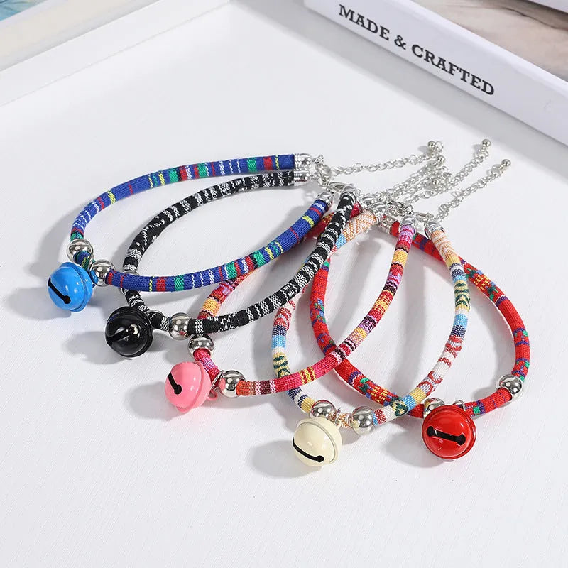 Ethnic pattern pet collar with bell attachment in multiple colour options including black blue pink red white
