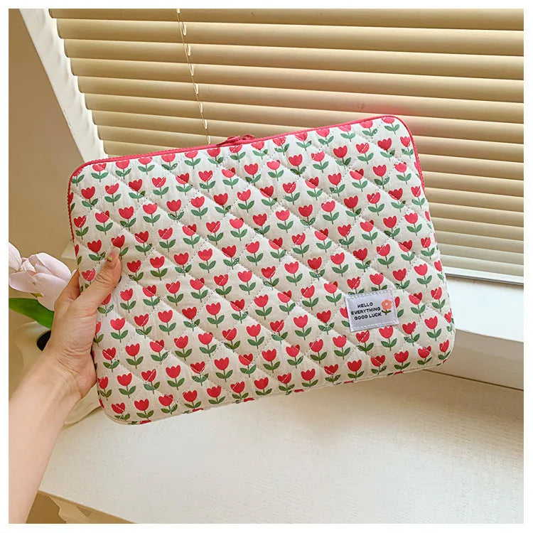 Floral print laptop bag for women in green flower pattern showing storage compartments and slim profile