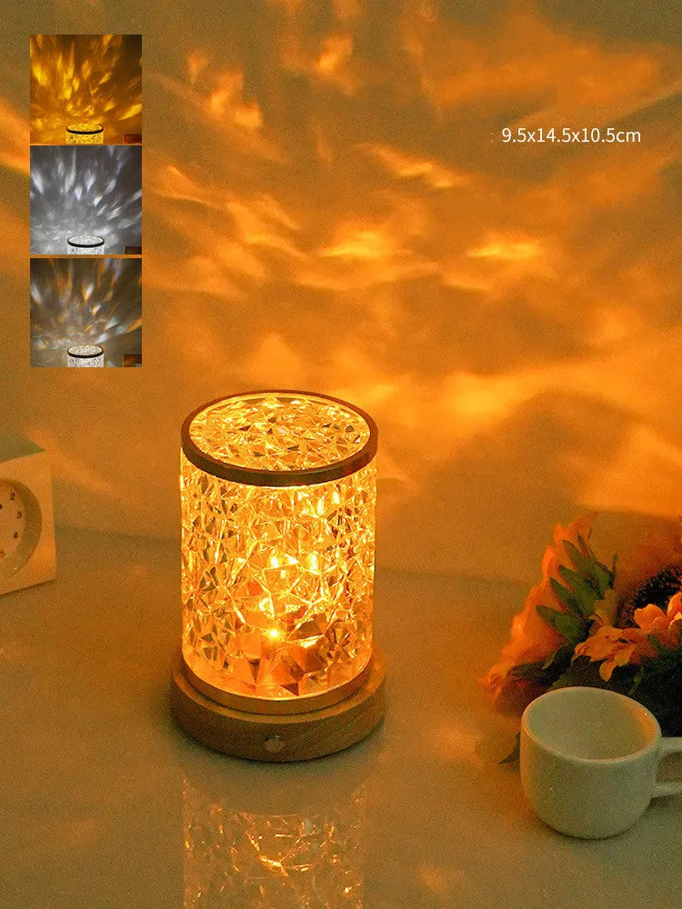 Modern rotating water ripple night light with acrylic body and solid wood base on a surface.