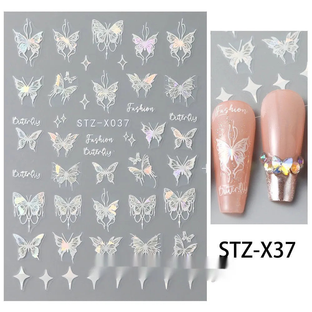 Plastic sheet of black, silver, and cartoon design nail art stickers for DIY manicures.