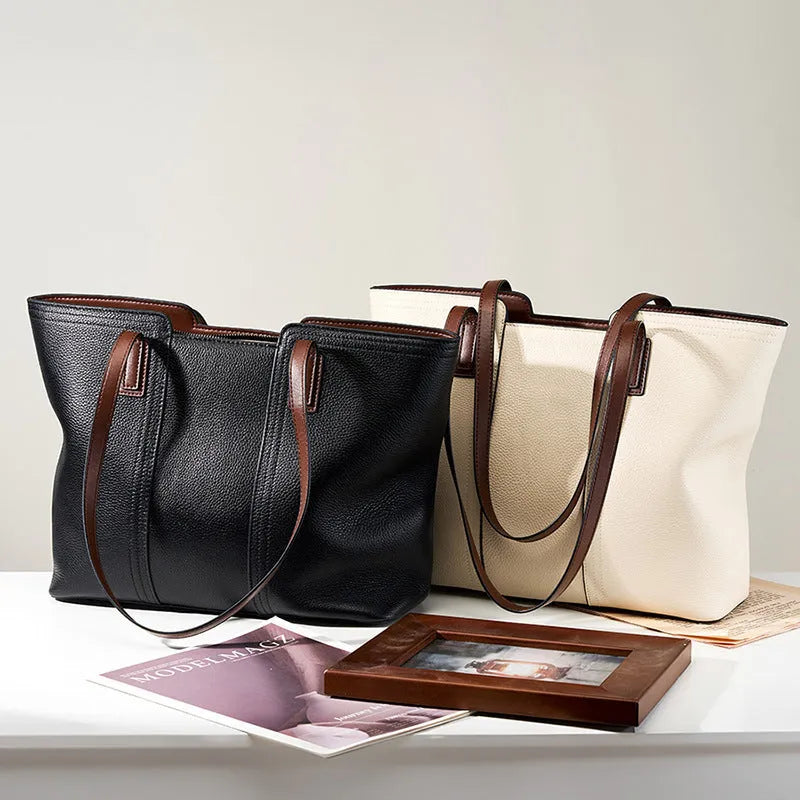 Women's genuine leather crossbody commuter bag in horizontal square shape with multiple internal compartments