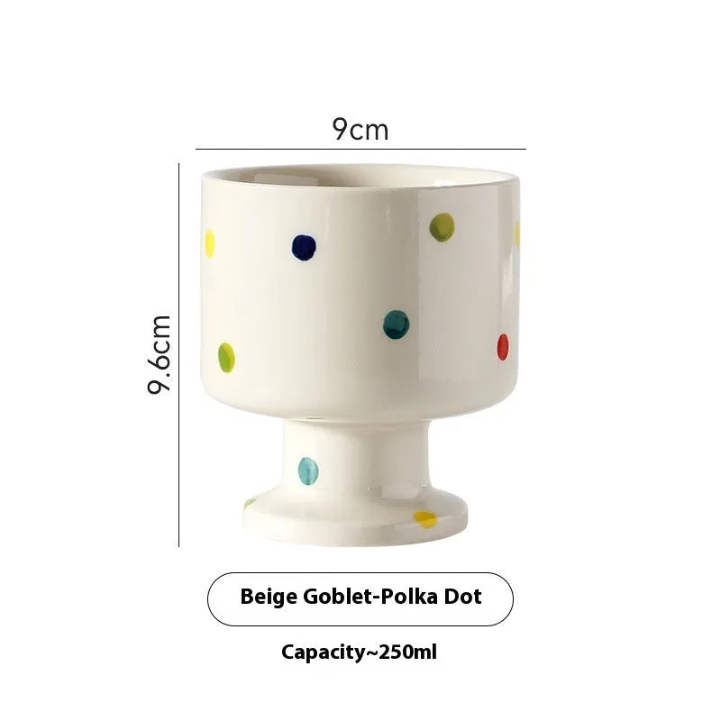 Hand-pinched irregular ceramic mug with solid colour design, approximately 14.5cm tall