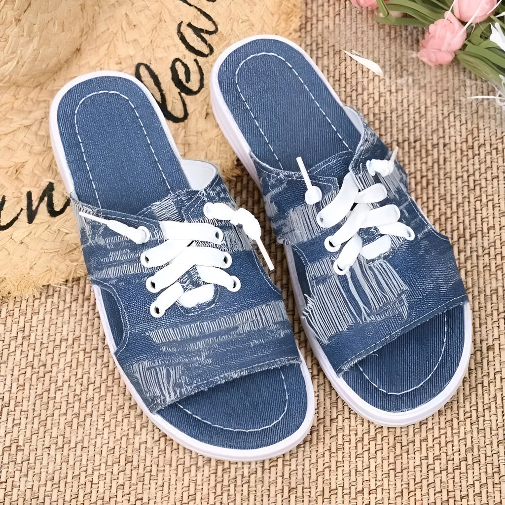 Blue women's Roman style canvas slippers with cloth lining and rubber soles