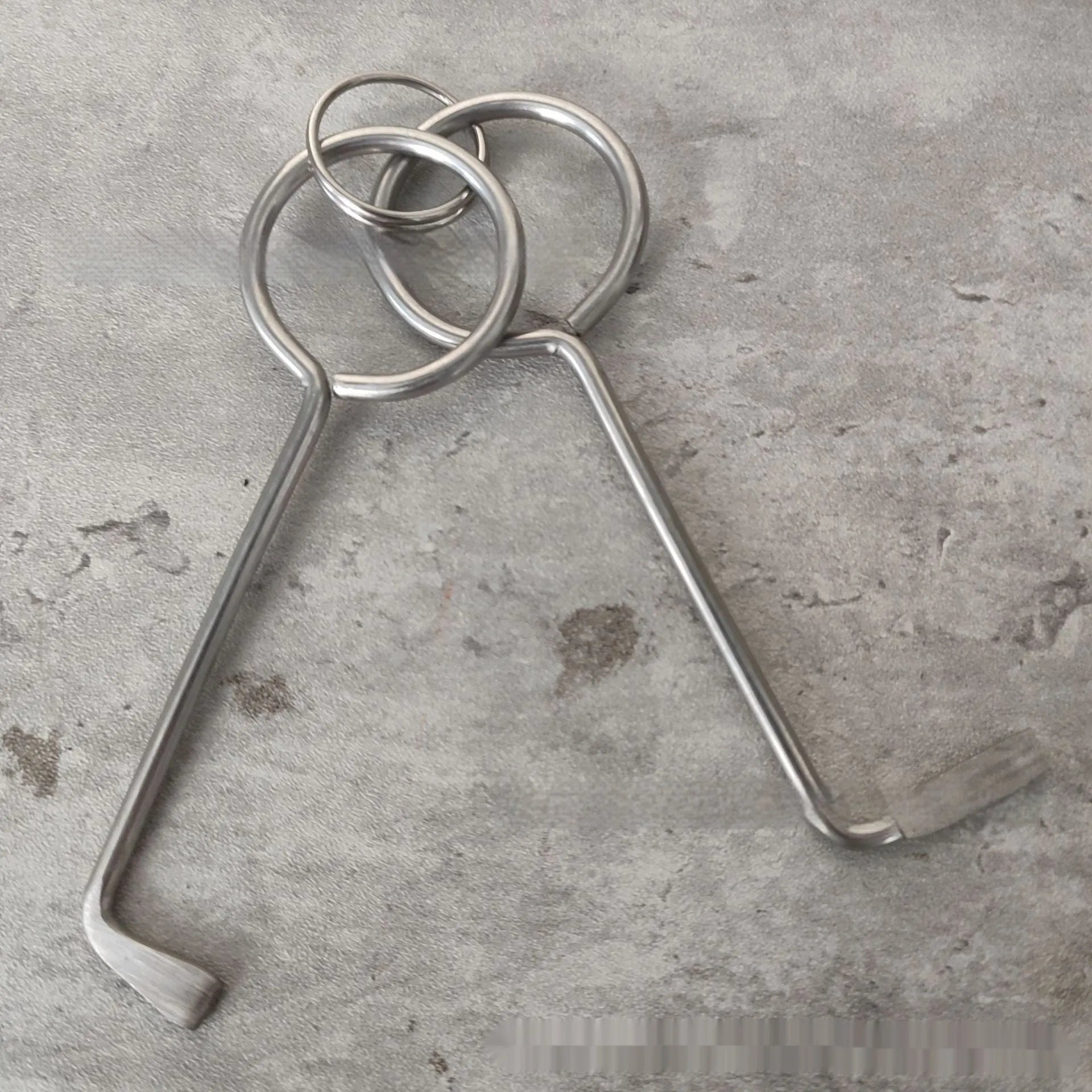 Two alloy wrench tools from portable family repair set