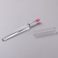 Set of reusable silicone lip brushes with protective caps in various colours.