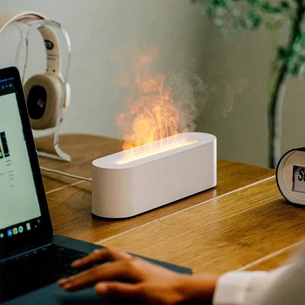 Square black lava flame aroma diffuser humidifier with USB cable on desktop