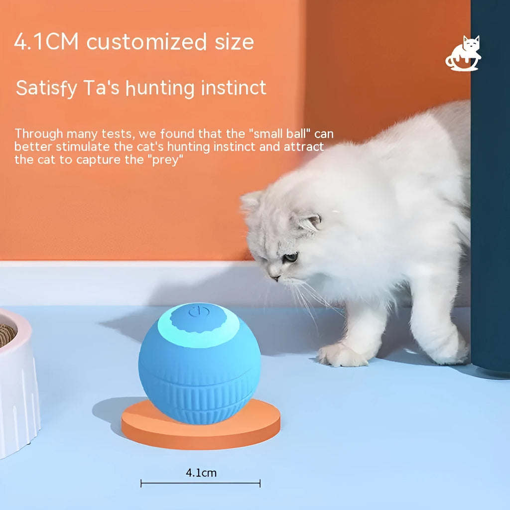 Blue silicone gravity rolling cat teasing ball on a light floor