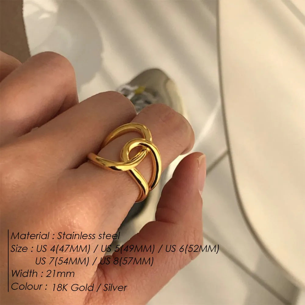 Adjustable stainless steel ring for women with a knotted geometric U-shape design in gold or silver tone.