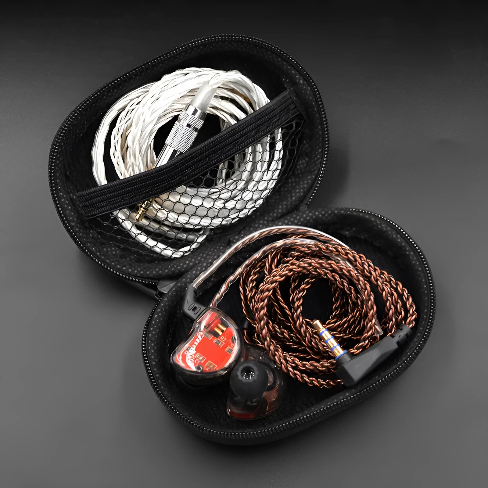 Black oval leather earphone storage bag with zipper closure for headphone protection