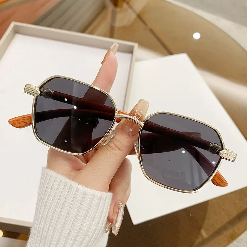 Women's frameless trim glasses with wood grain pattern and gold alloy frame.