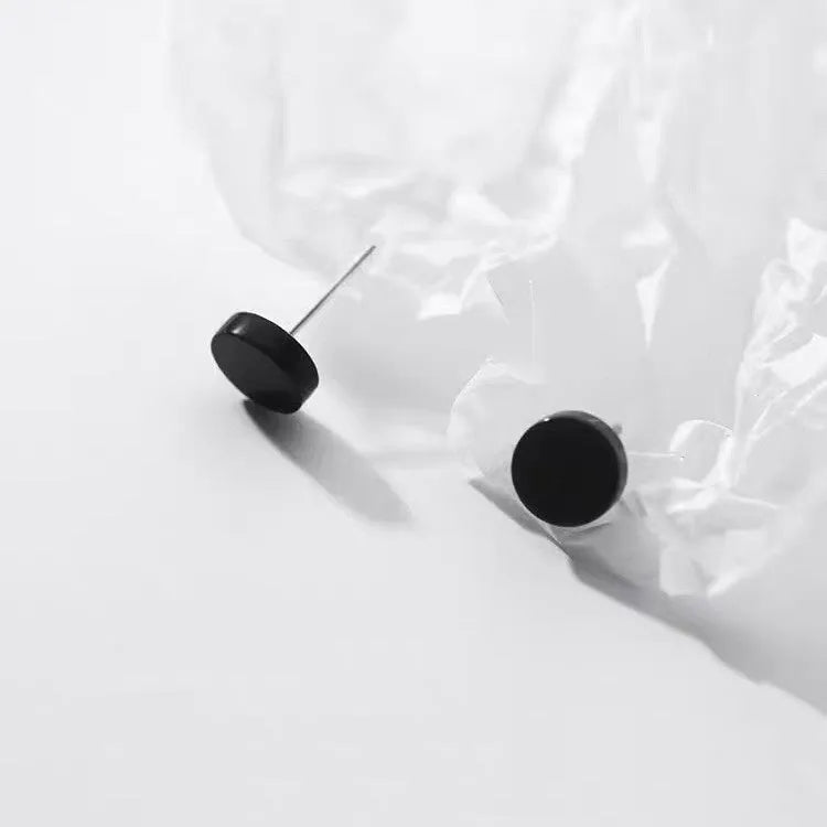 S999 sterling silver flat ear bone studs in geometric round shape, silver and black colour options