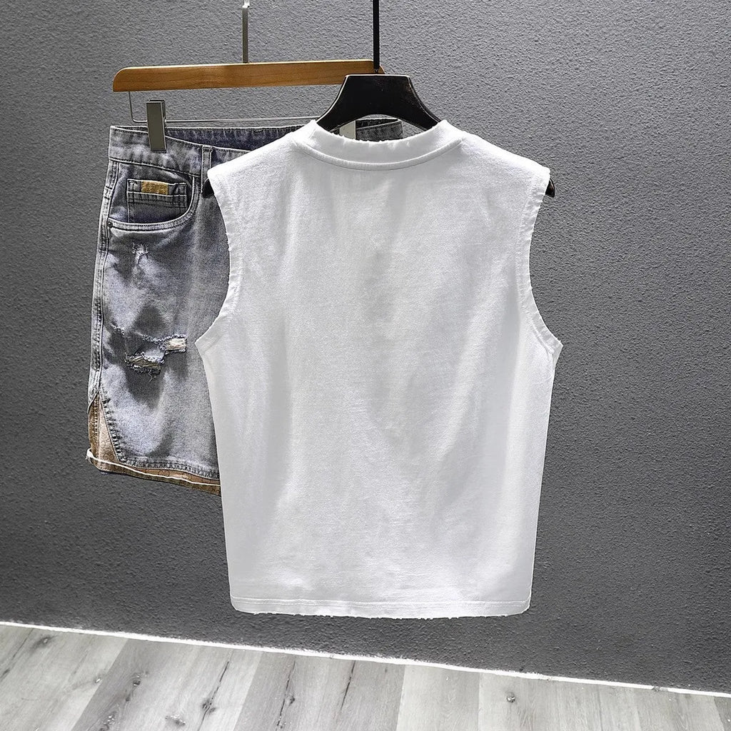 Solid colour cotton sleeveless fitness t-shirt showing loose fit and straight hem design