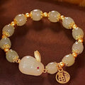 Green fu hare jade pendant on black elastic women's bracelet