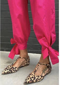 Women's leopard print pointed toe pumps with chunky heel and cross straps