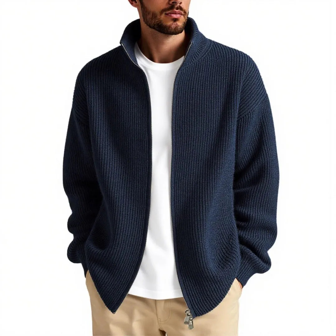 Man wearing a loose-fit grey cardigan sweater coat for casual leisure wear.