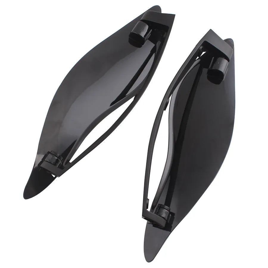 Pair of smoked ABS windshield side wings for a Harley-Davidson trike conversion.