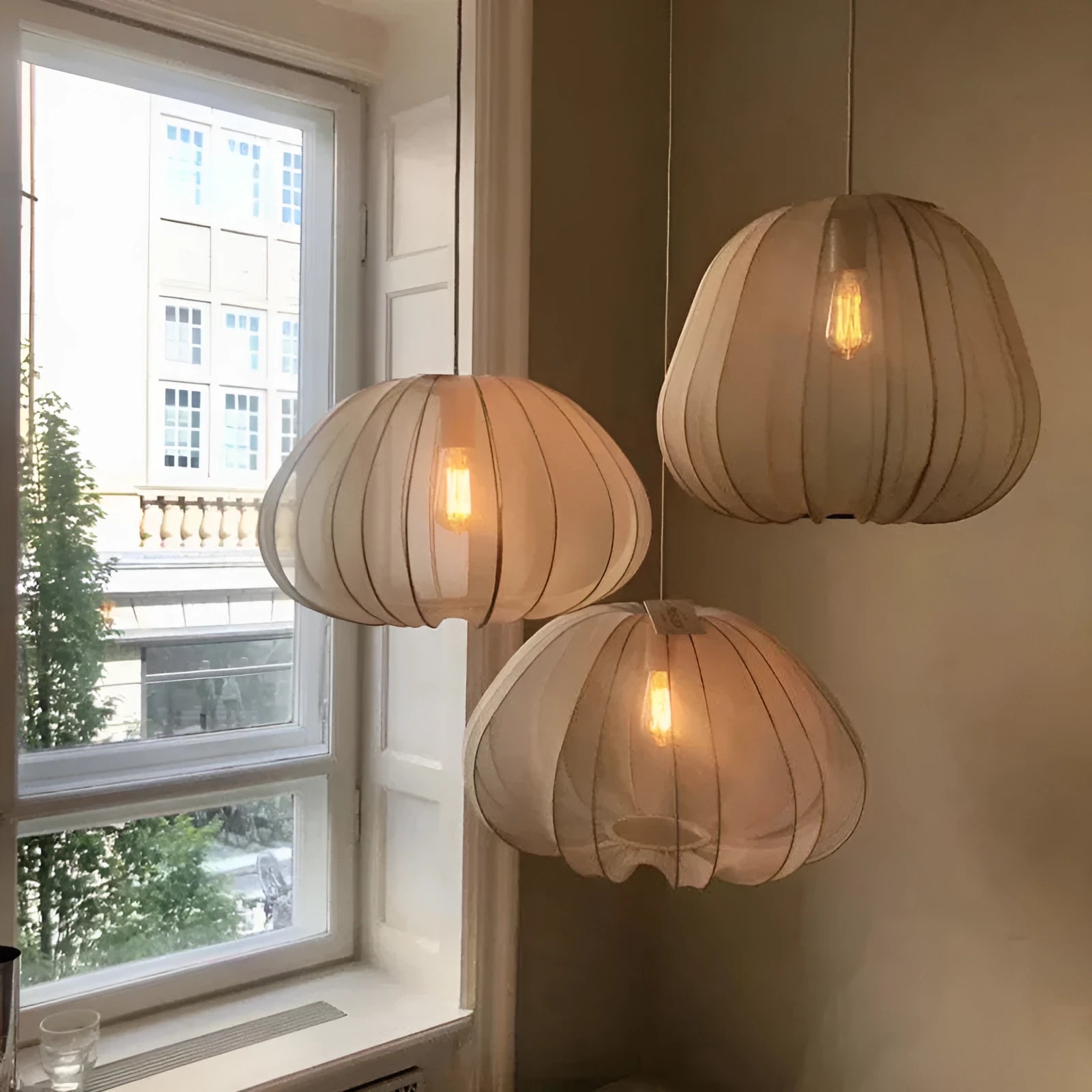 Japanese style pumpkin ceiling lamp with branch design in white finish showing LED illumination