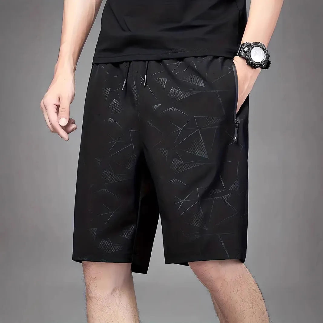 Men's loose sports shorts in black with fifth pants length for beach volleyball