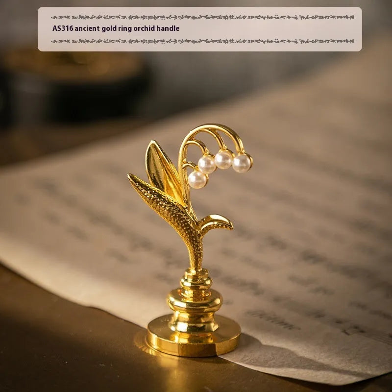 Wooden wax seal handle with decorative metal component in antique silver finish