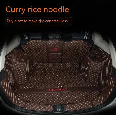 Mitsubishi Outlander custom boot liner with 3D raised edges and non-slip surface in a vehicle boot.
